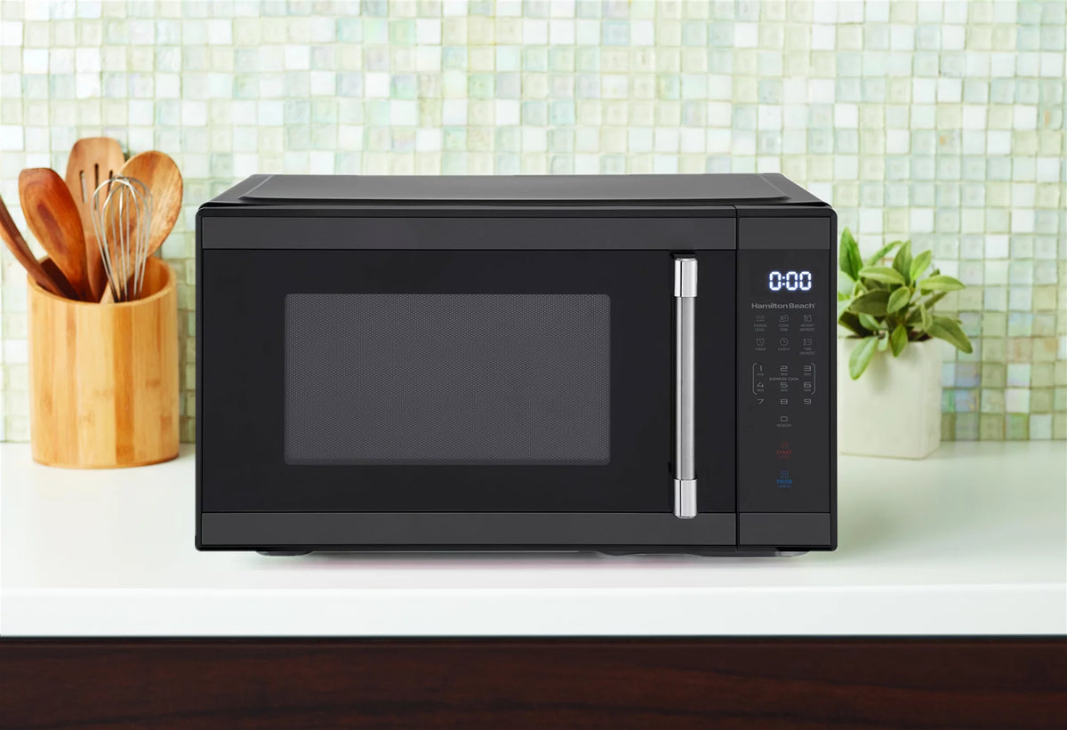 1.1 cu. ft. 1000 Watts White Stainless Steel Microwave Oven Q18040