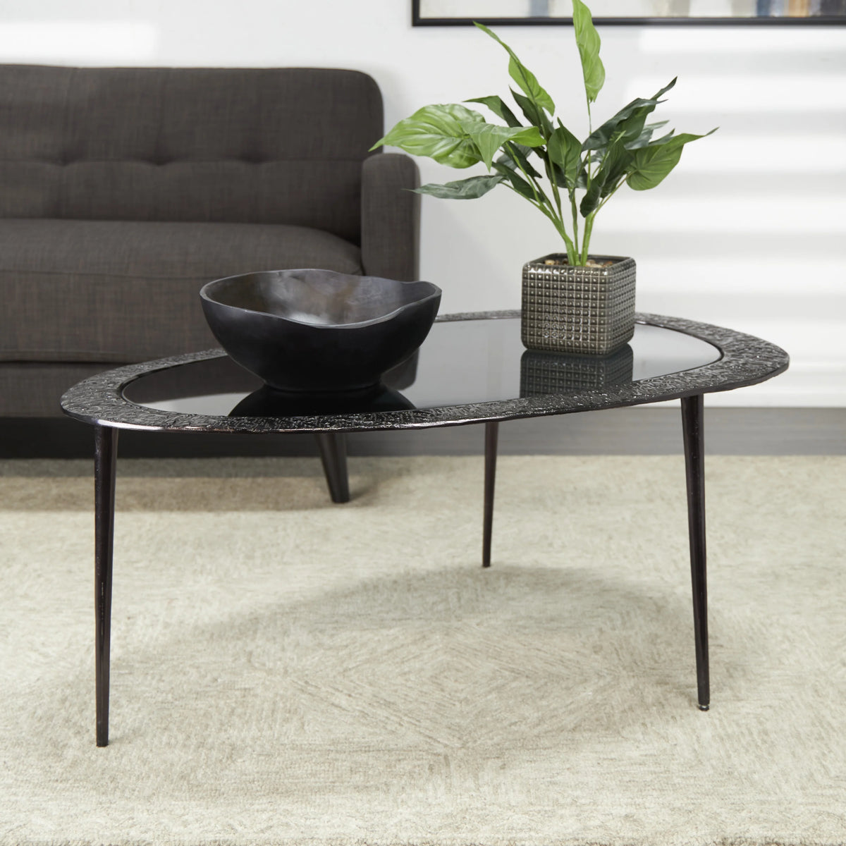 30" x 18" Black Aluminum Oval Coffee Table with Glass Top Z4357